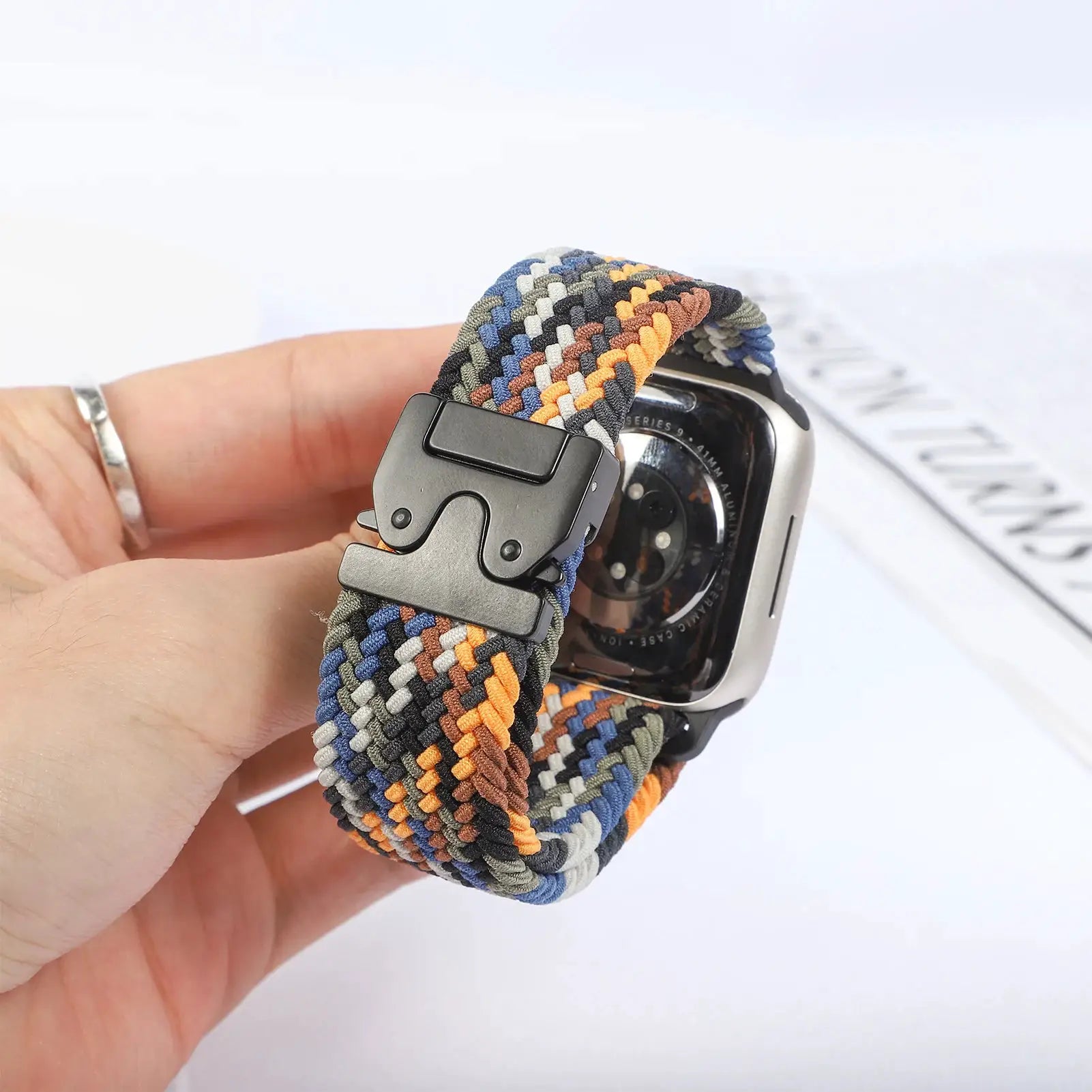 Braided parachute strap for Apple Watch; multicolor blue, orange, gray, green, brown; fits 41–49mm watches