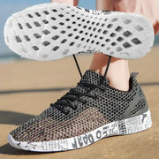 Simples Market men's mesh sneakers for summer with black/gray knit upper and newspaper-print foam sole