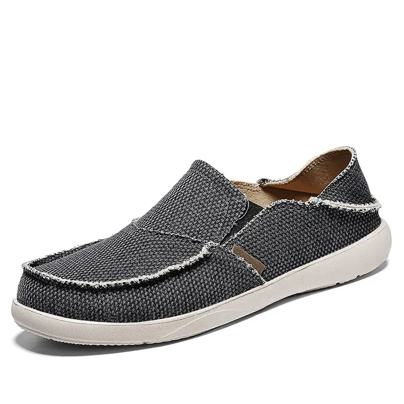 Simples Market lightweight canvas slip-on loafers for men, navy woven fabric with white sole.