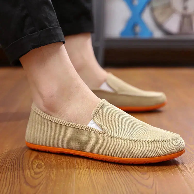Men's beige fabric loafers slip-ons by Simples Market with orange outsole