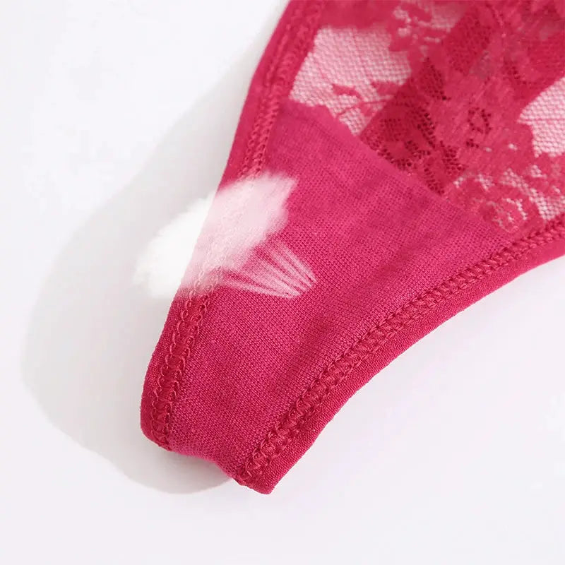 Women's pink lace thong underwear by Simples Market with floral lace design.