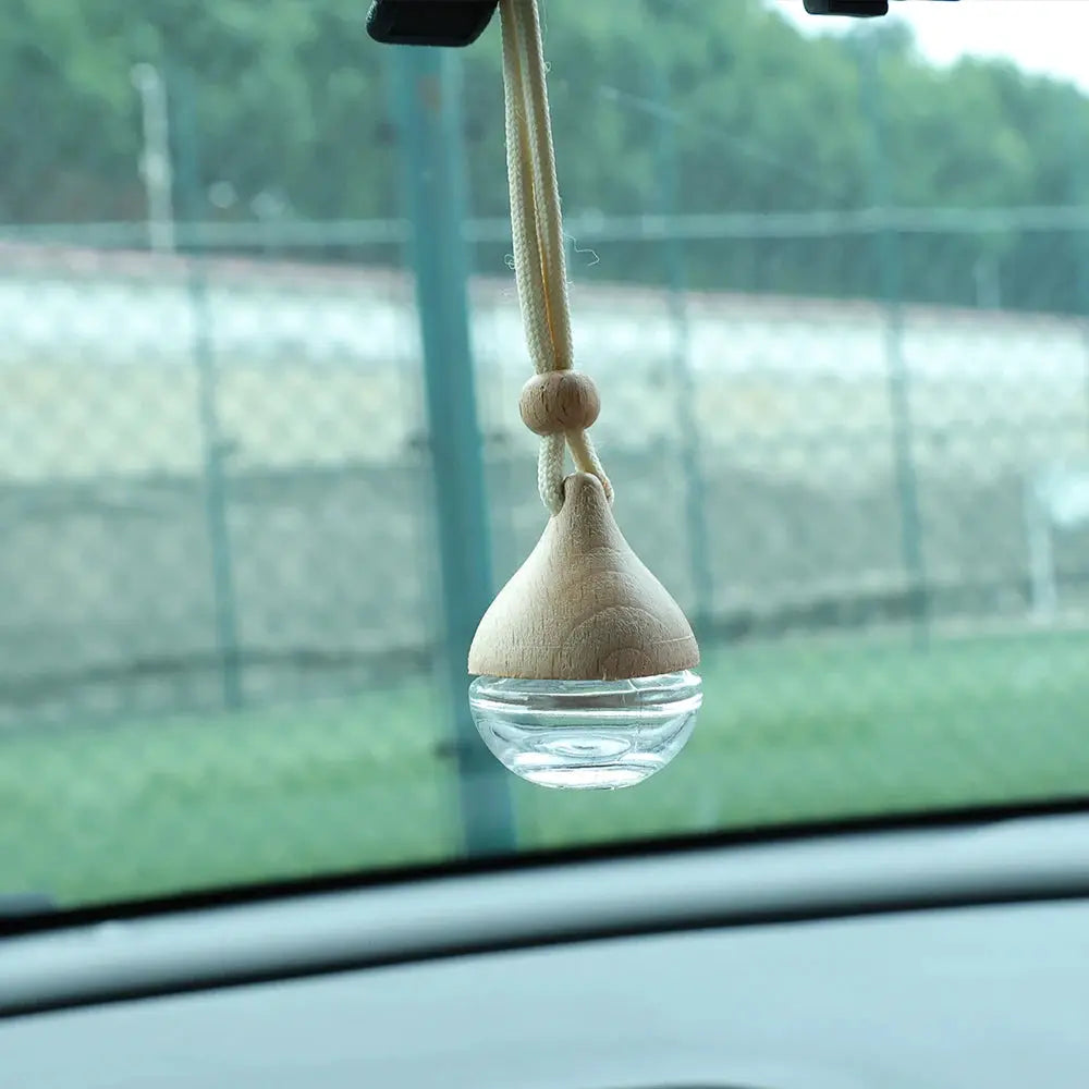Round Car Perfume Bottle Ornament Aromatherapy Essential Oil Diffuser Hanging Auto Air Freshener Car Interior Decoration