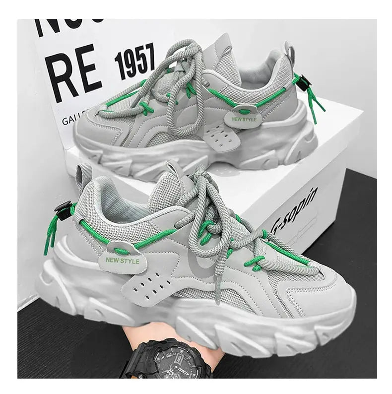Men's sneakers by Simples Market; two gray breathable-mesh shoes with thick white sole and green laces