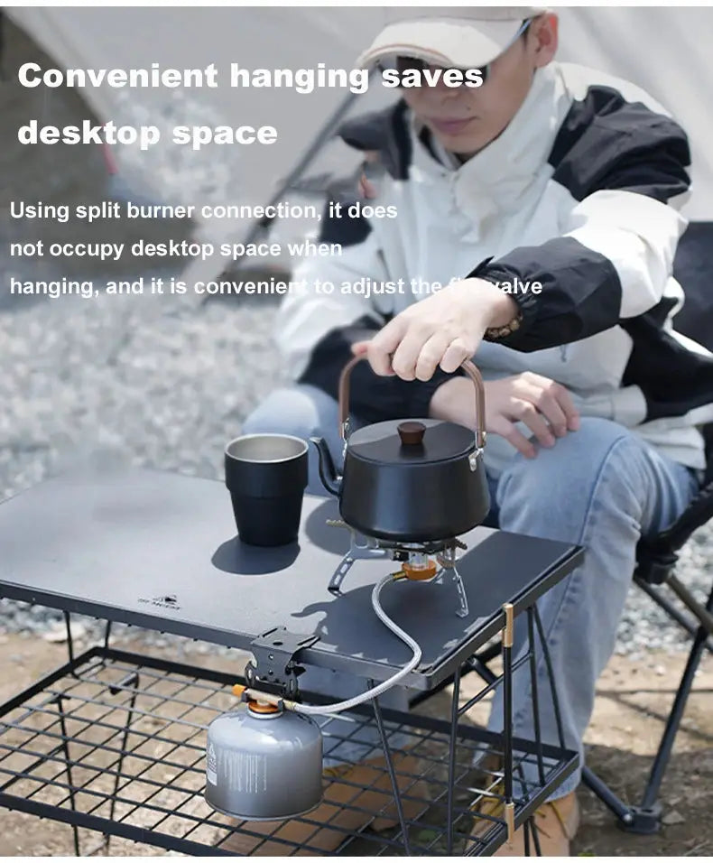 Simples Market hang gas canister hook with hanging plate for camping, metallic black on a compact outdoor table