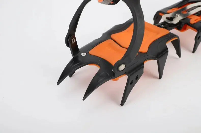 Simples Market 12-tooth ice crampons with orange and black frame and stainless steel spikes