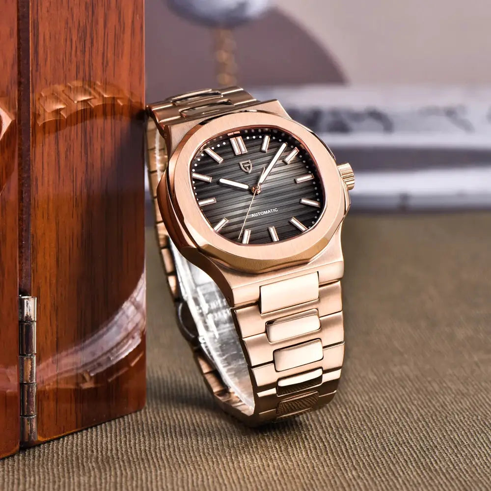 Pagani Design rose-gold men's automatic wristwatch with black striped dial and stainless steel bracelet.