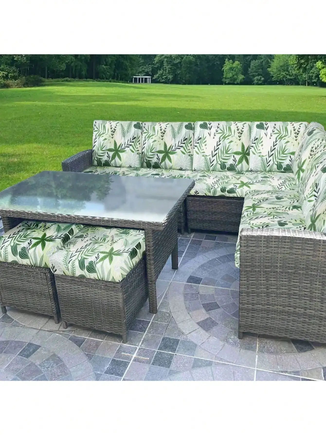 Outdoor tropical leaf print sofa cushion covers for individual seat cushions, green on ivory.
