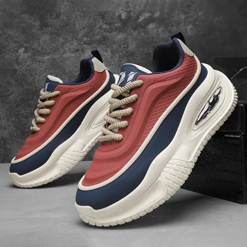 Men's casual sports shoes with thick white sole, red and navy panels, pair of skate sneakers
