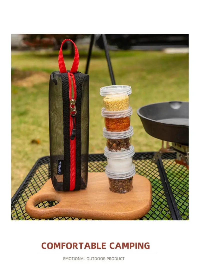 Simples Market portable camping spice kit with five clear stackable jars and red zipper pouch.