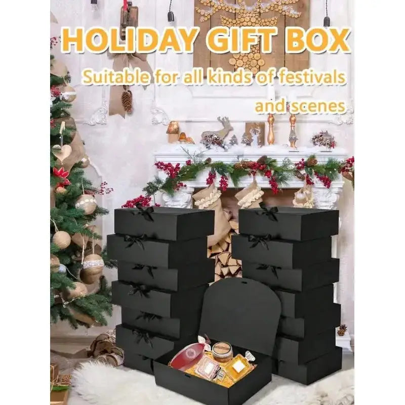 Deluxe black gift box set with lids and ribbons, 5-piece, arranged around a faux fireplace with Christmas decor.