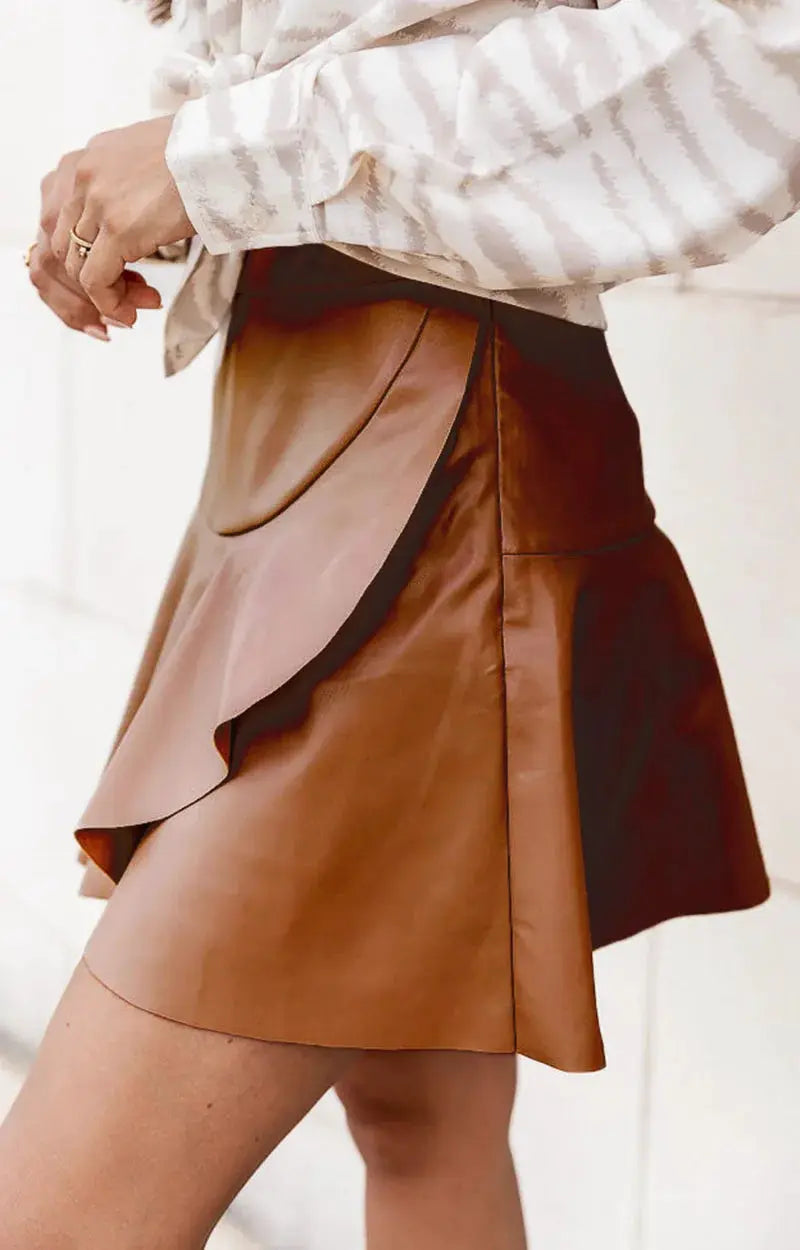 Women PU leather mini skirt with elastic high waist and layered ruffle panels in tan