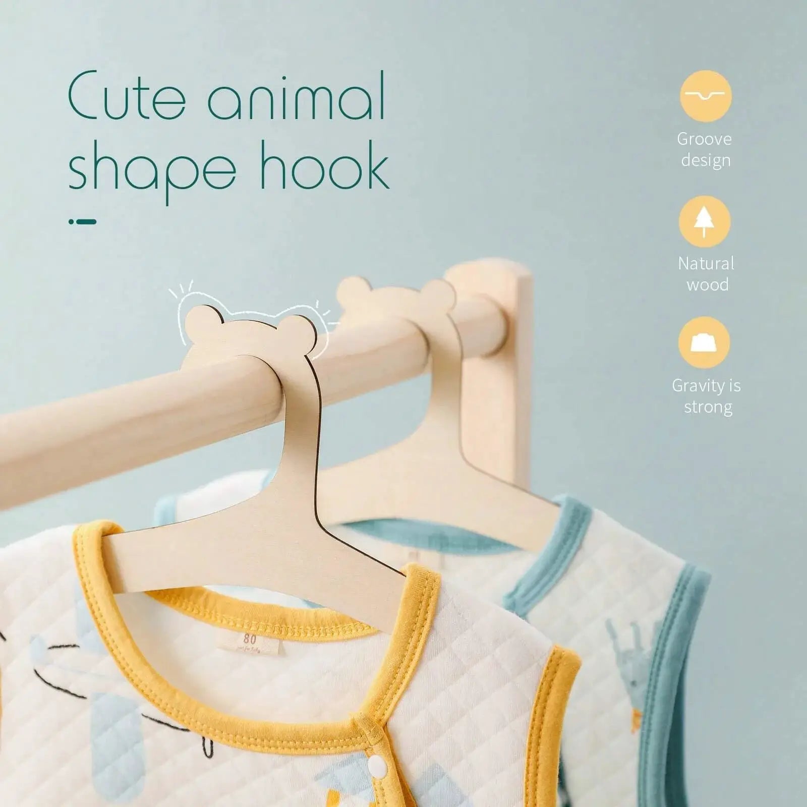 Bear-shaped wooden baby clothes hangers on a natural wood rack for kids (2 pcs)