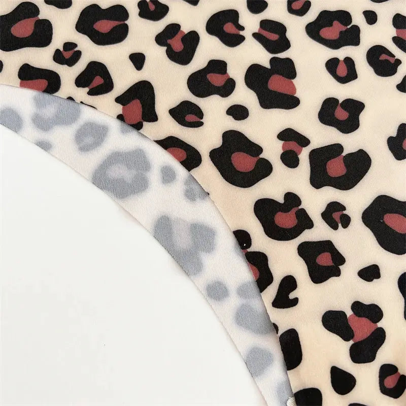 Women's leopard print seamless thong underwear in beige fabric with black and pink spots