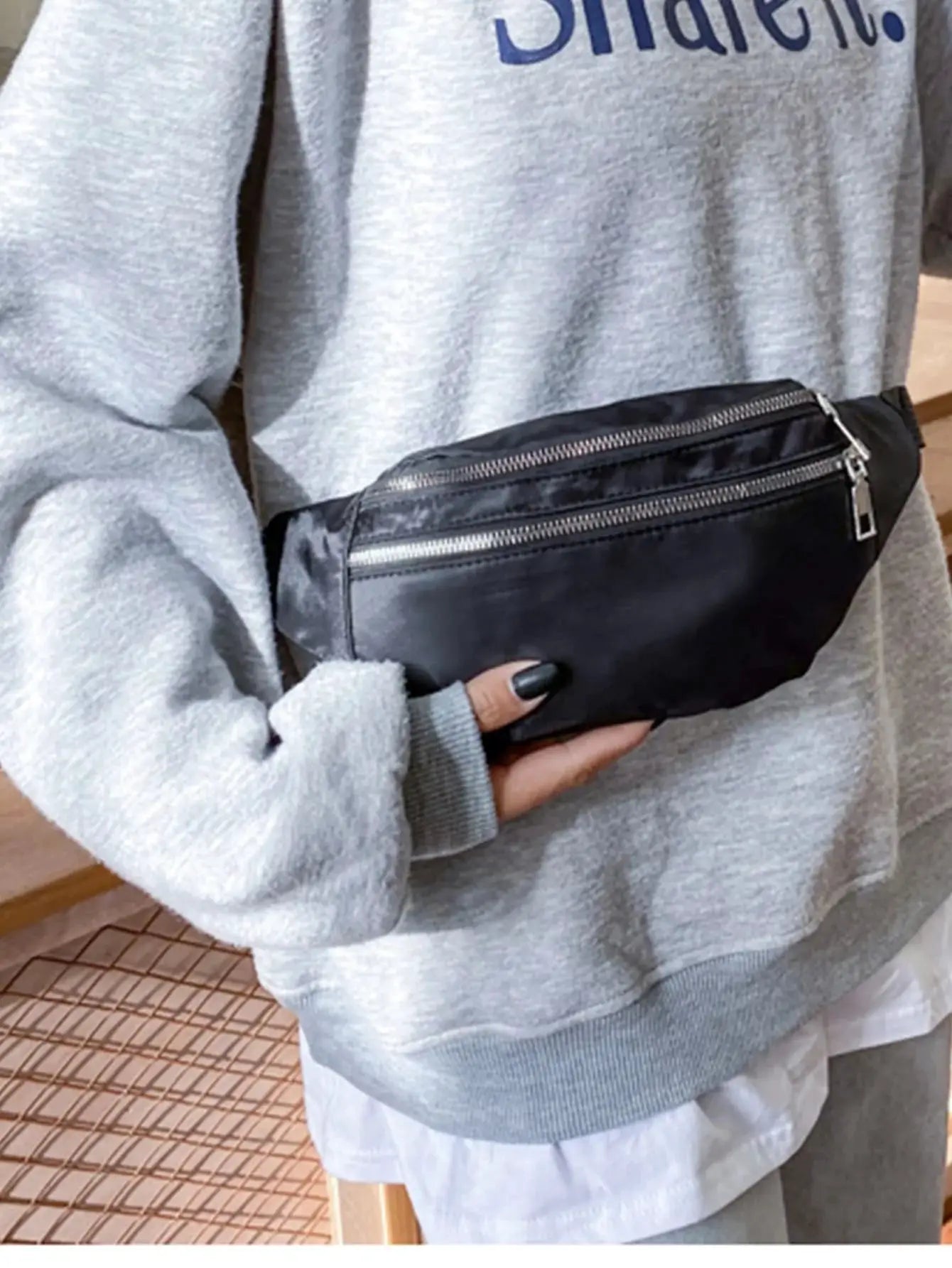 Fanny pack waist bag in black nylon with dual zip compartments