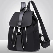 Women backpack Simples Market, black nylon with large capacity and front zip pockets.