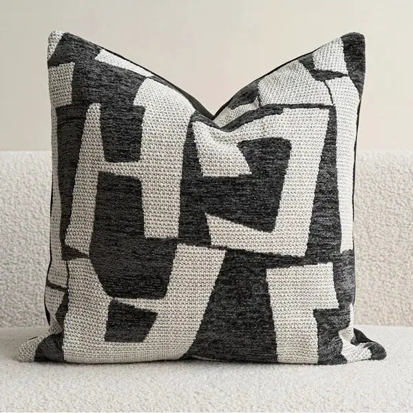 Geometric pillow cover in ivory and black for modern sofa and chair decor