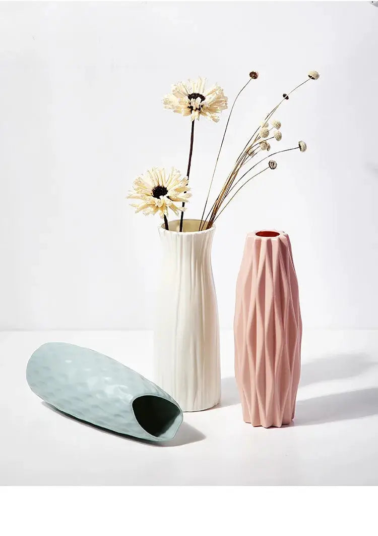 Nordic plastic vase set of three pastel vases in white, pink and blue with textured surfaces
