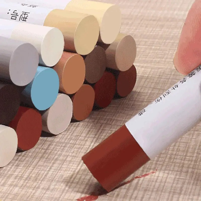 Wood scratch repair pen set by Simples Market with assorted color pigment sticks for furniture repair