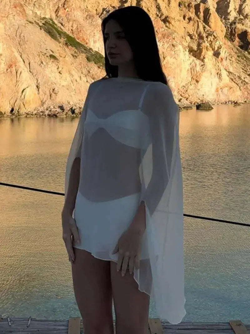 Women's white see-through chiffon cover-up with long sleeves over swimwear