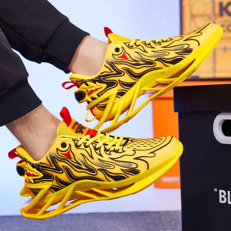 Pair of yellow athletic sneakers with black flame design and red pull tabs, breathable running shoes