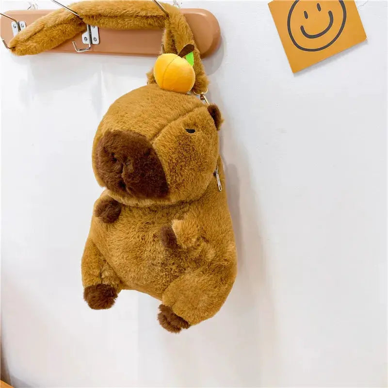 Cute plush capybara backpack in brown, soft crossbody bag by Simples Market