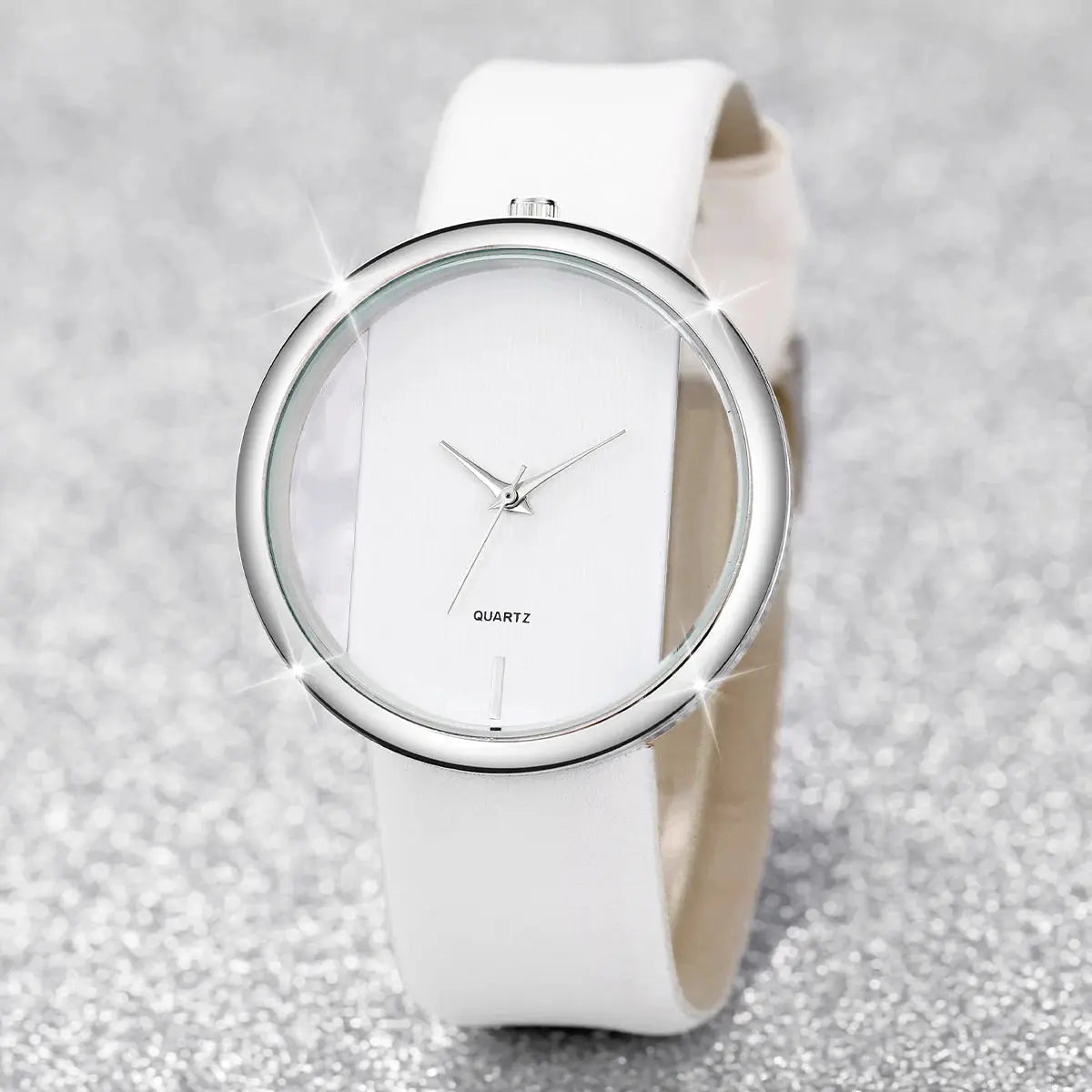 Women's white leather strap quartz watch with hollow round dial and silver-tone bezel