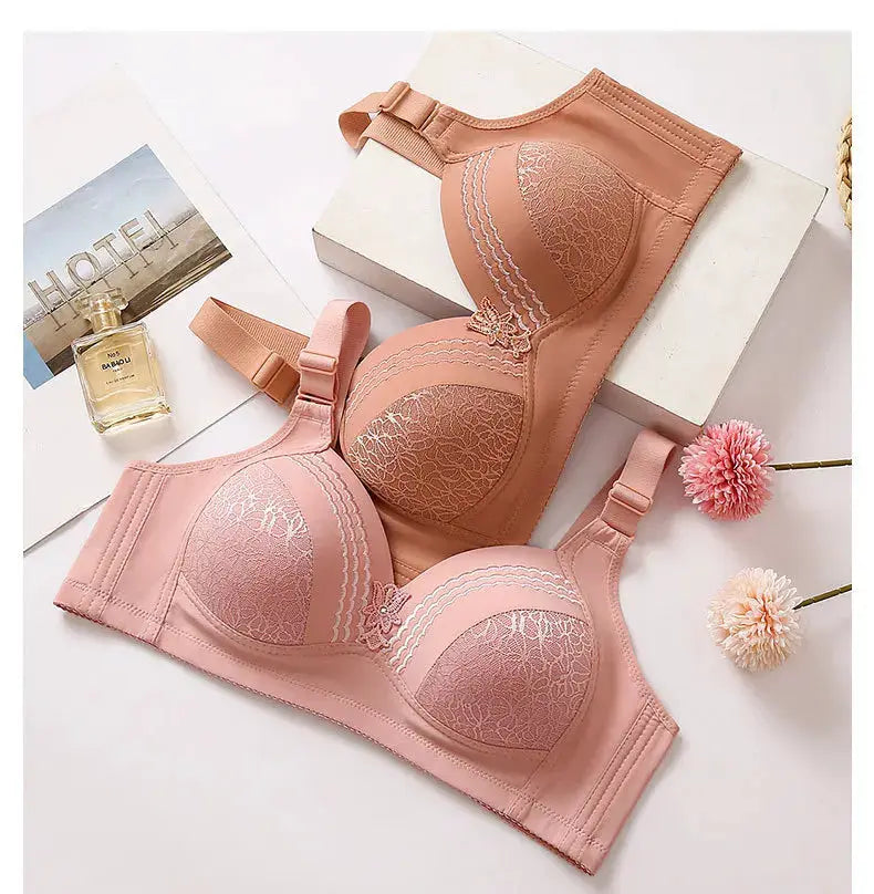 Simples Market wireless lace bra set in pink and peach; non-underwire, glossy satin cups with floral lace, two bras.