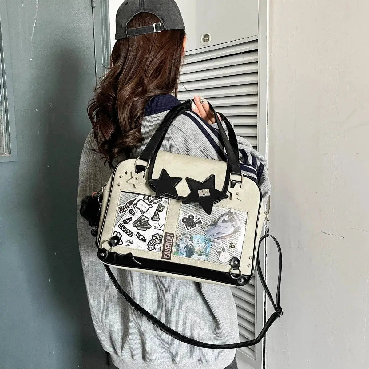 Y2K star Ita bag by Simples Market, beige body, black star appliques, pocket with sticker art, crossbody strap