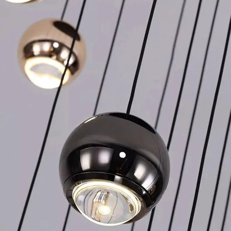 Modern black glass globe pendant light with integrated LED ring and metallic inner accent for living and dining rooms