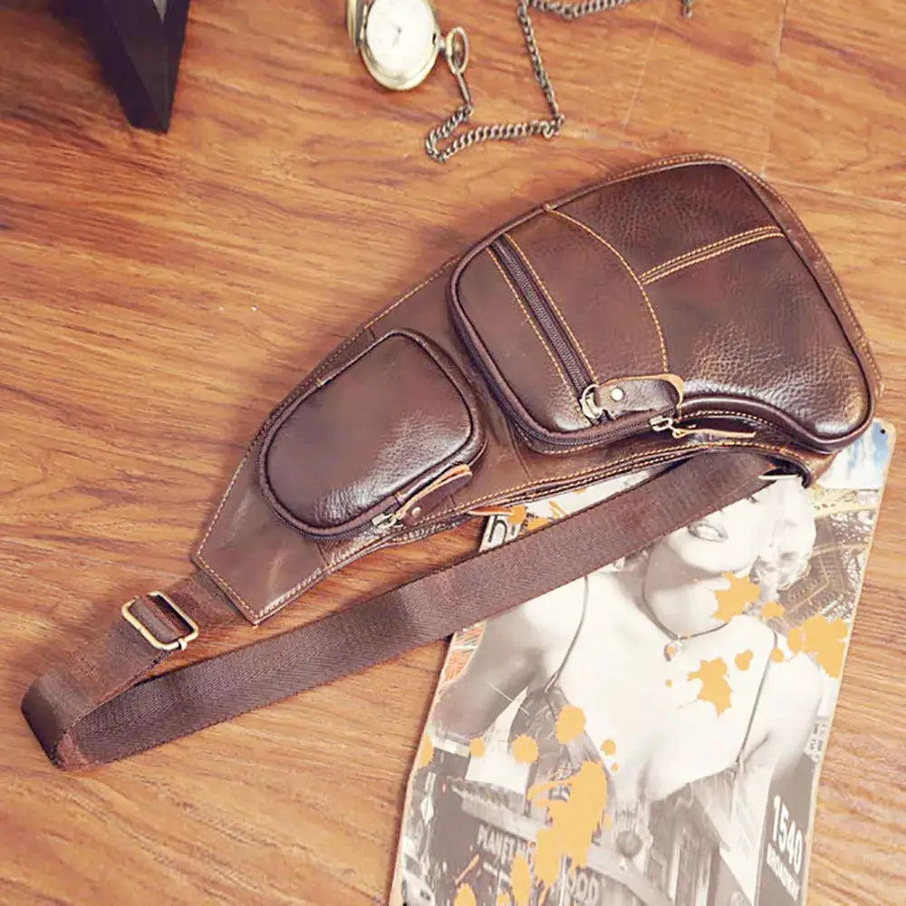 Simples Market men's brown genuine leather crossbody sling bag with two zip pockets and adjustable strap