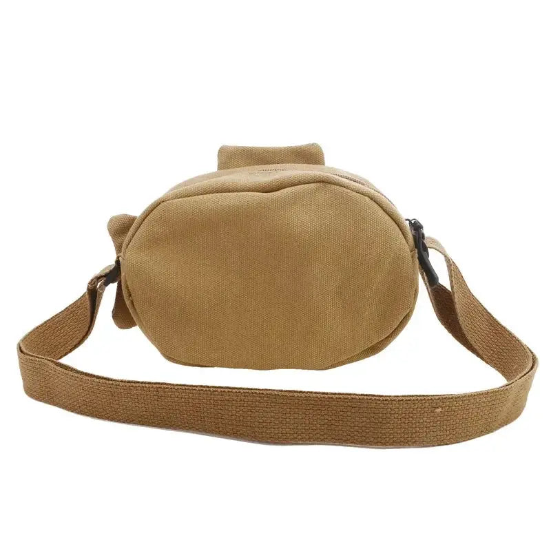Fish Shape Canvas Messenger Bag by Simples Market, tan compact zippered crossbody with adjustable strap.