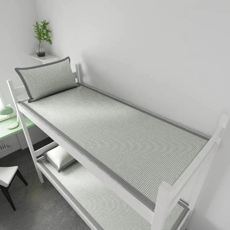 2-piece ice silk sleeping mats on white bunk bed; grey jacquard surface, breathable nonwoven covers