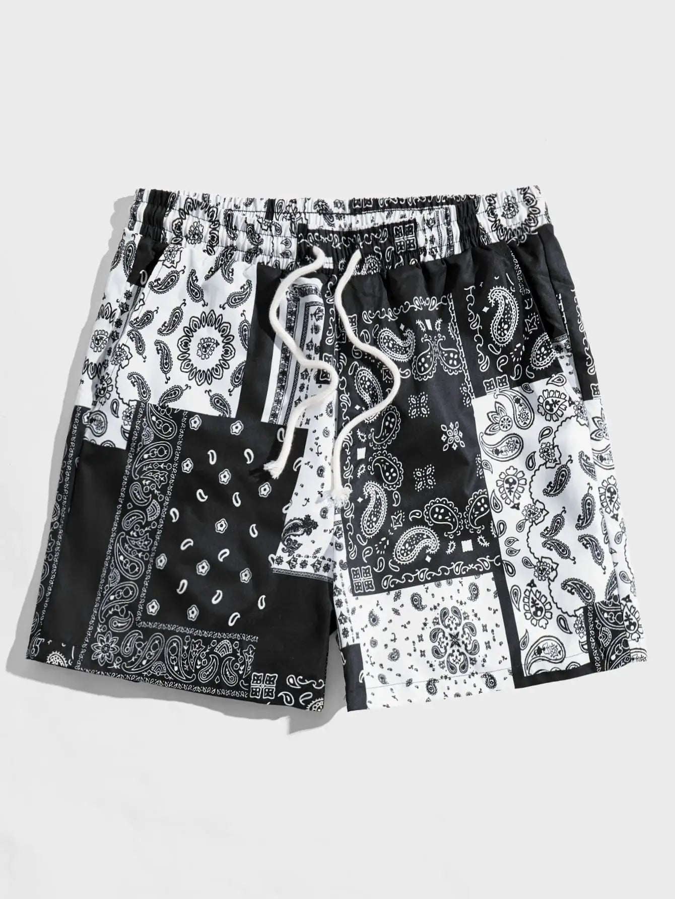Beach shorts by Simples Market, bandana-print black-and-white patchwork with drawstring waist