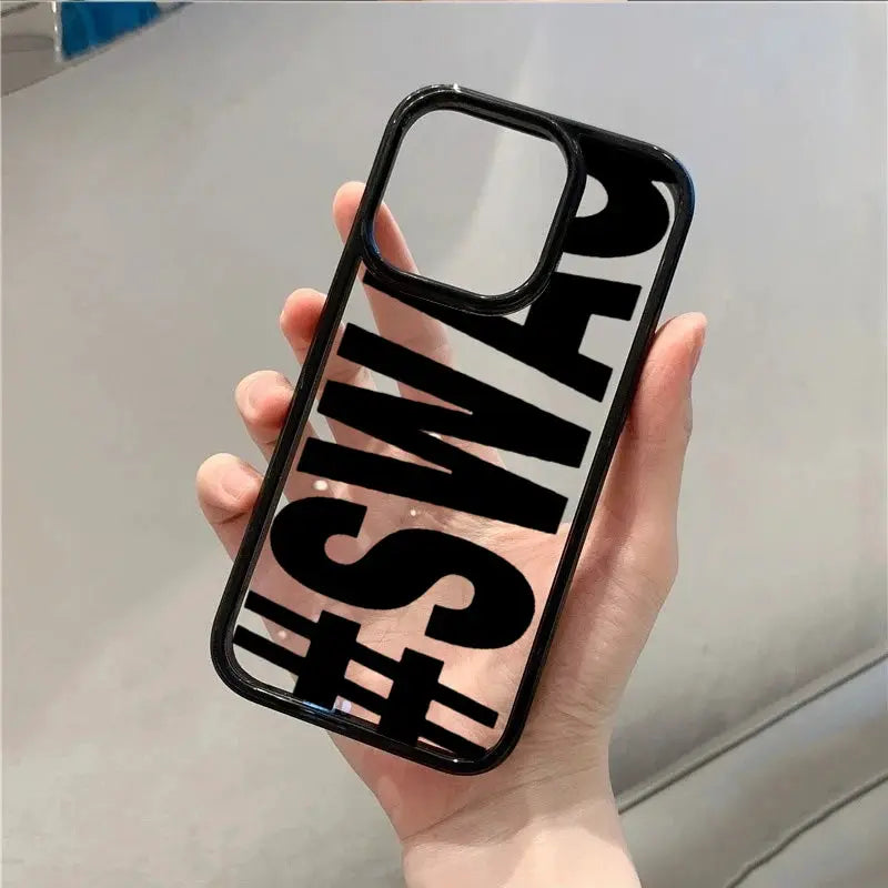 SWAG bold-letter iPhone case with black frame and pink backing, large SWAG text