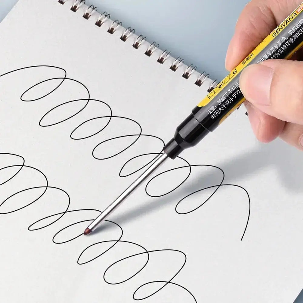 Simples Market long-nib carpenter marking pen, 45mm nib, yellow/black body, drawing spiral lines on a notebook.