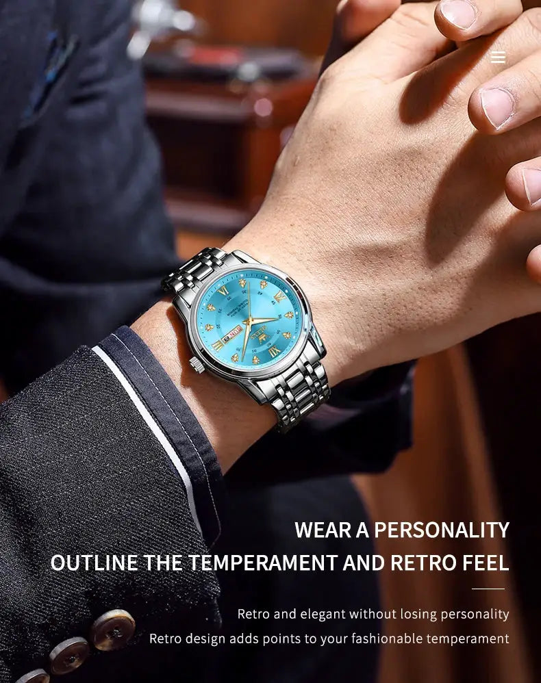 OLEVS men's quartz watch with blue dial, diamond hour markers, dual calendar, and stainless steel bracelet