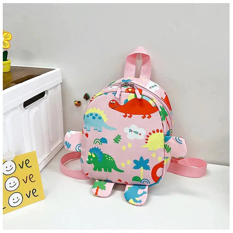 Simples Market pink dinosaur kids backpack with colorful dinosaur prints and pink straps