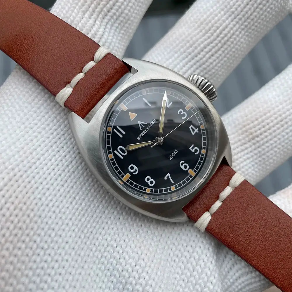 STEELFLIER SF745 wristwatch, unisex 36mm case, black dial with white numerals, brown leather strap