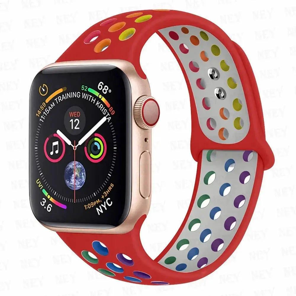 Silicone sport strap for Apple Watch by Simples Market, Pride rainbow perforated design, fits 38–45mm.