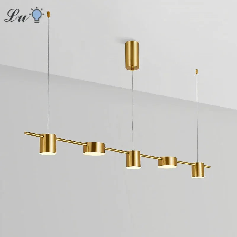 Modern LED linear pendant chandelier with five gold cylindrical lights on a bar, suspended from ceiling