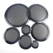 Seven round speaker grills in black metal mesh with plastic frames, sizes from 2 to 8 inches.