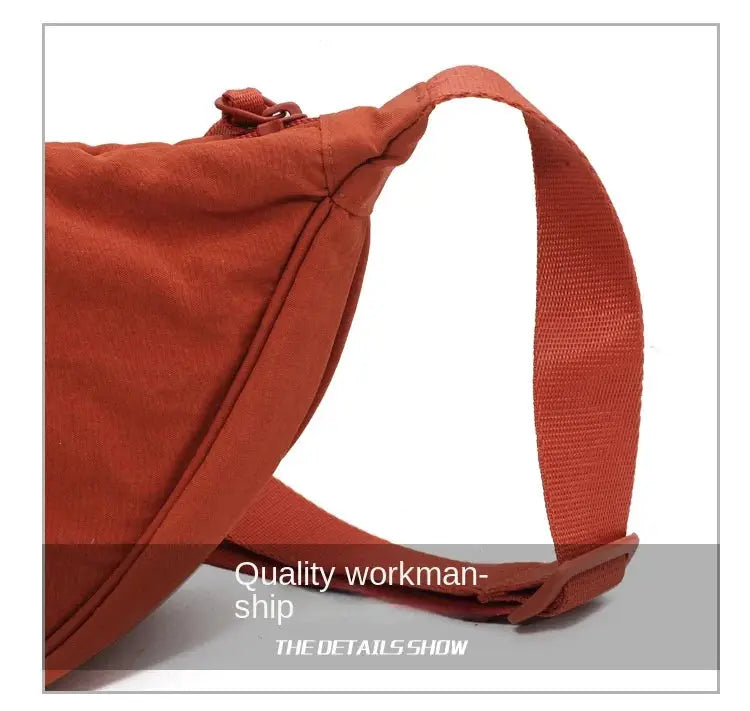 Casual nylon crossbody bag by Simples Market in orange with wide strap, large capacity.