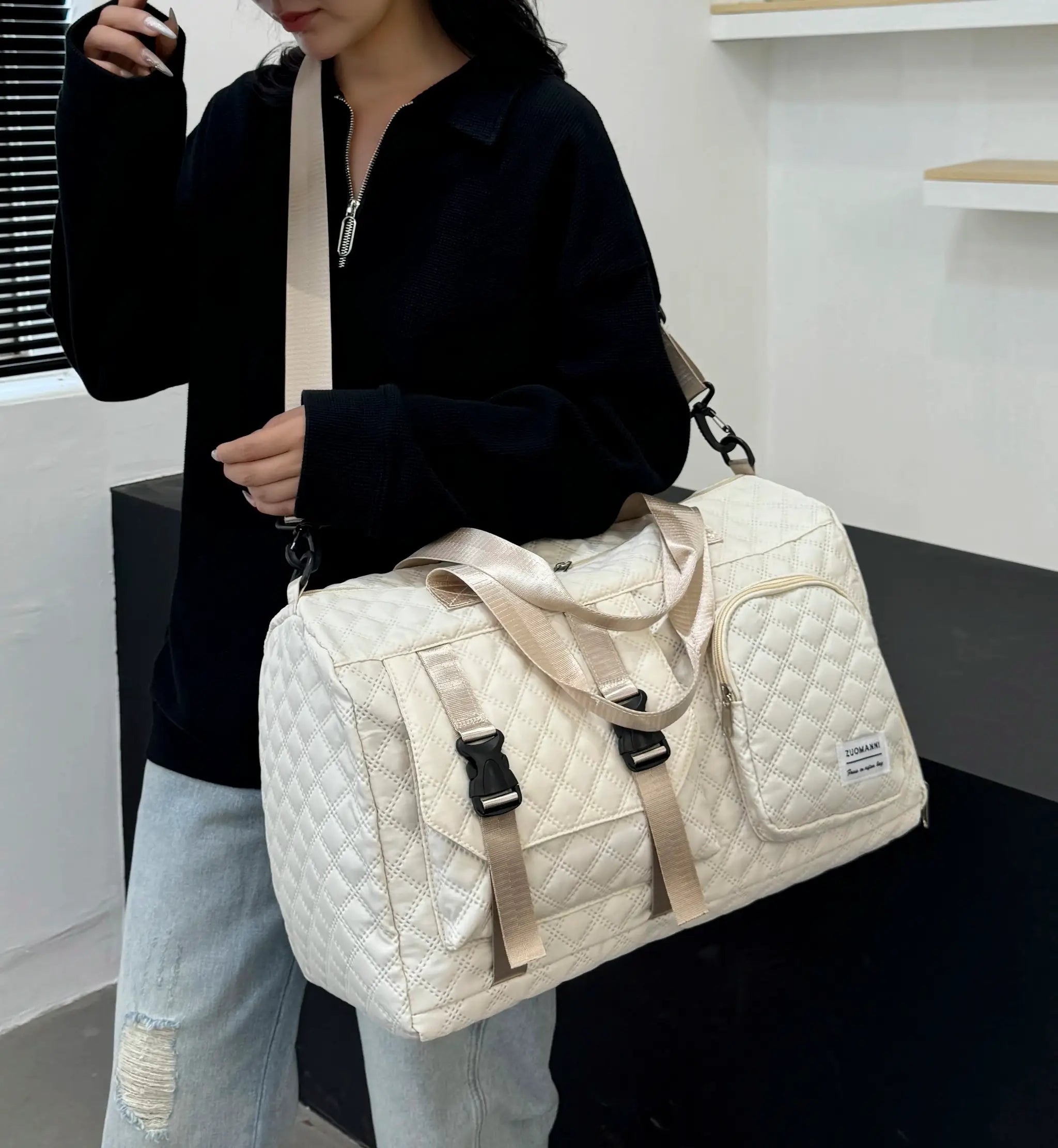 Simples Market beige quilted nylon travel duffle bag with tan handles and shoulder strap