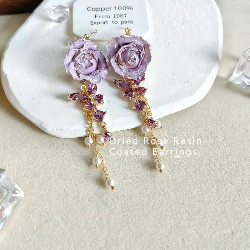 Immortal rose long earrings with lavender epoxy resin roses, gold chain, crystal petals and pearl drops
