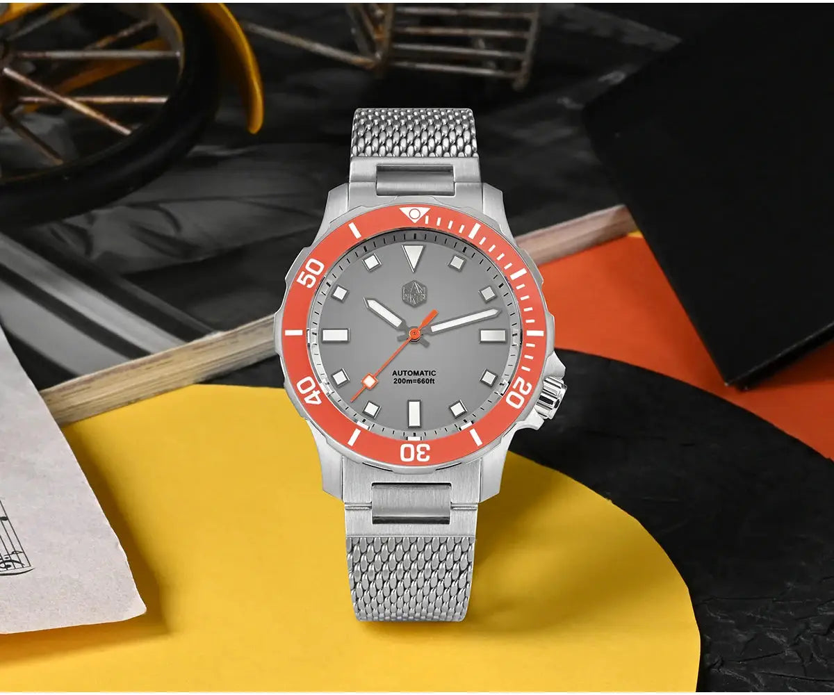 San Martin diver watch with orange bezel, gray dial, stainless steel Milanese bracelet, 200m water resistant