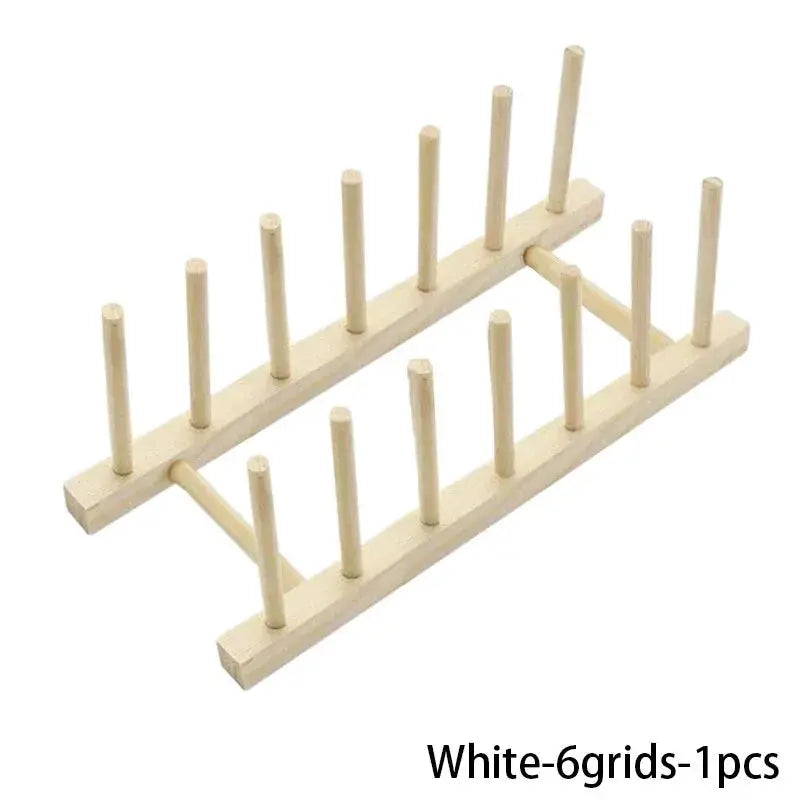 Wooden dish drying rack with peg-style drainboard for kitchen organization