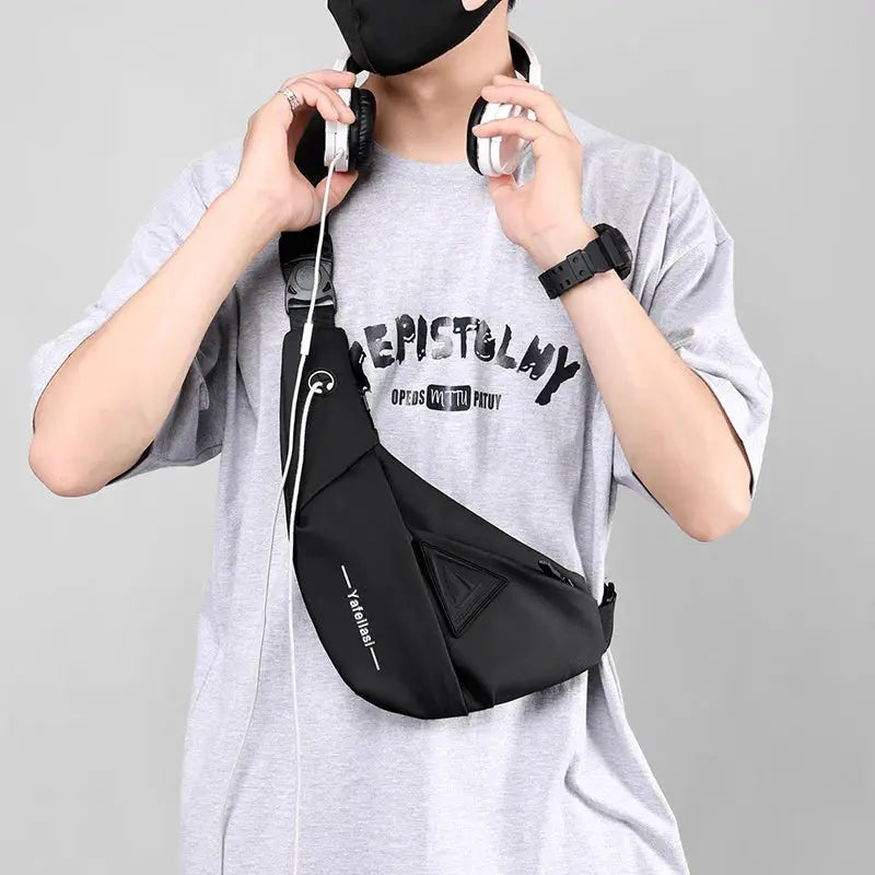 Sling chest bag, black compact crossbody bag for men with anti-theft design