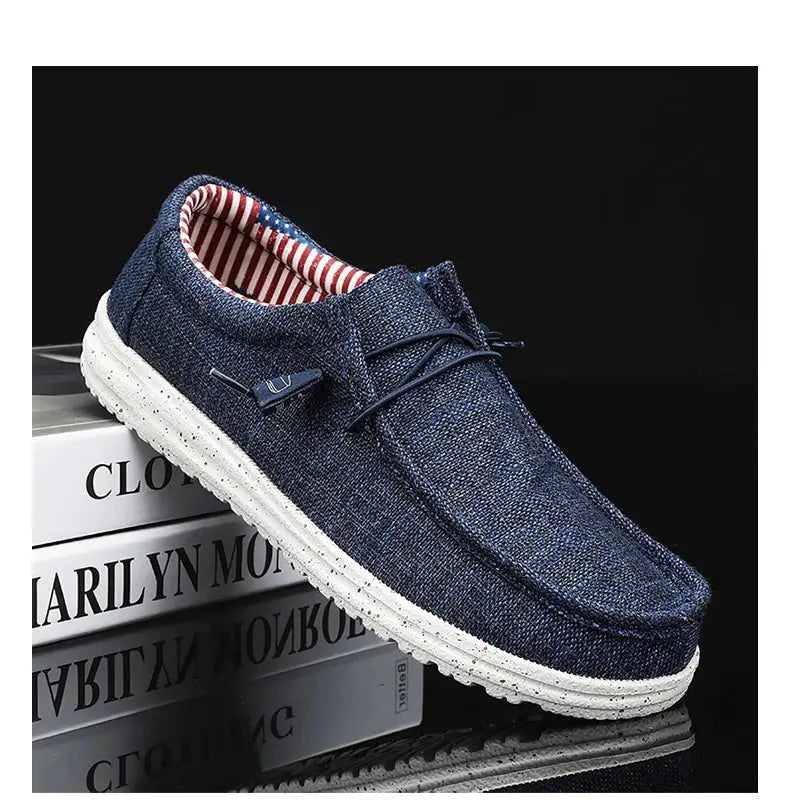 Men's casual canvas loafers in blue denim with a white speckled sole