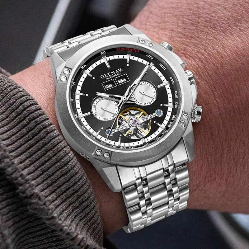 Glenaw men's automatic mechanical watch with skeleton dial and tachymeter bezel on a silver stainless steel bracelet