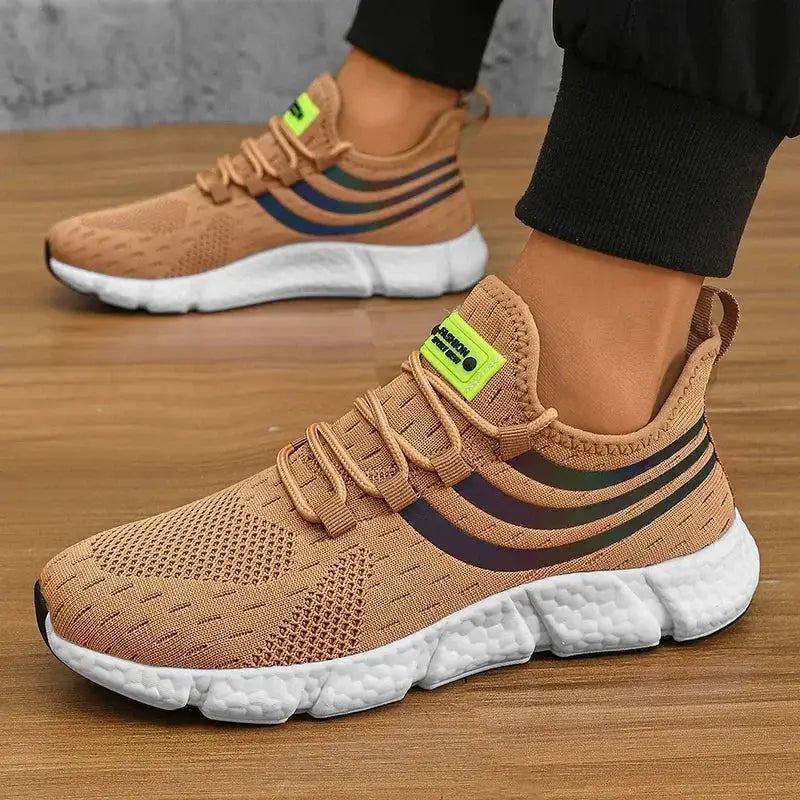 Pair of men's tan breathable mesh sneakers by Simples Market with white cushioned platform sole and dark stripes.